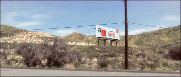 _1AR3471-roadside McDonalds sign, leaving LA