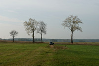 The road runs from Lomza towards Stawiski. Near the town is an unmarked spot, the Jewish Cemetery